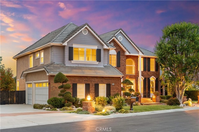 3048 Street Of The Chimes, Chino Hills, CA 91709 - view of front of house featuring concrete driveway, an attached garage, and brick siding
