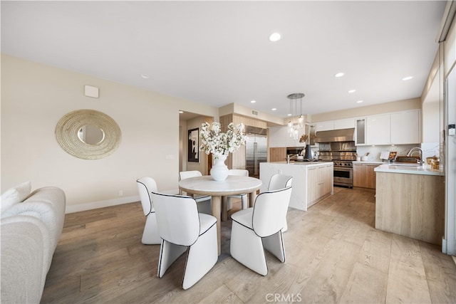 3048 Street Of The Chimes, Chino Hills, CA 91709 - dining space with light wood-style flooring and recessed lighting