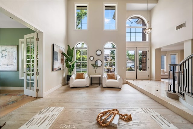 3048 Street Of The Chimes, Chino Hills, CA 91709 - foyer entrance featuring a high ceiling, french doors, and stairway