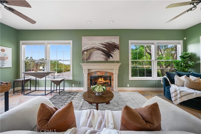 3048 Street Of The Chimes, Chino Hills, CA 91709 - living room with ceiling fan, baseboards, a tiled fireplace, and recessed lighting