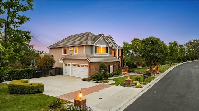 3048 Street Of The Chimes, Chino Hills, CA 91709 - traditional-style house with an attached garage, concrete driveway, stucco siding, and brick siding