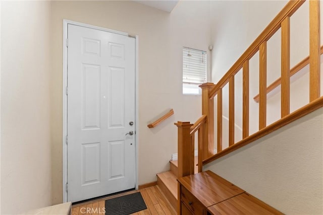 1972 W Blue Violet Ct, Anaheim, CA 92801 - entryway featuring light wood-type flooring and stairs