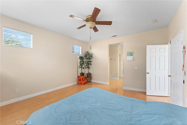 1972 W Blue Violet Ct, Anaheim, CA 92801 - bedroom featuring light wood-style floors, baseboards, and ceiling fan