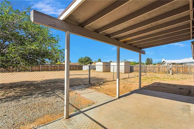 22331 Ramona Ave, Apple Valley, CA 92307 - fenced backyard with a patio area