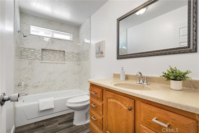 22331 Ramona Ave, Apple Valley, CA 92307 - full bath with vanity, shower / tub combination, wood tiled floors, and toilet