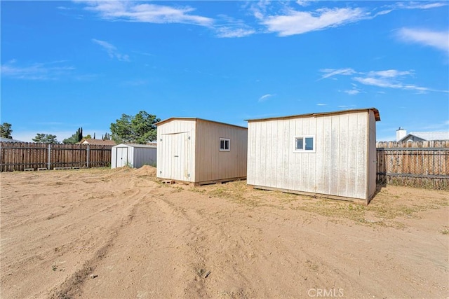 22331 Ramona Ave, Apple Valley, CA 92307 - view of shed with a fenced backyard