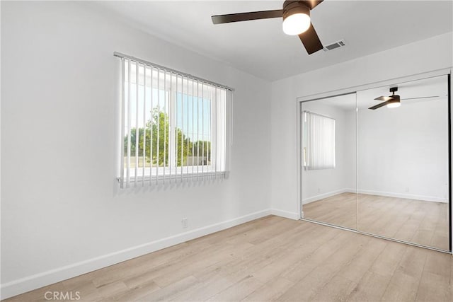 22331 Ramona Ave, Apple Valley, CA 92307 - unfurnished room with a ceiling fan, wood finished floors, and baseboards