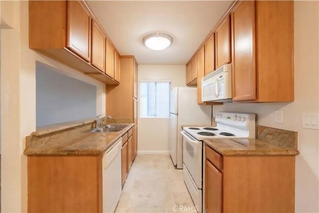 1105 Sepulveda Blvd # C101, Torrance, CA 90502 - kitchen featuring white appliances, a sink, baseboards, and light stone countertops