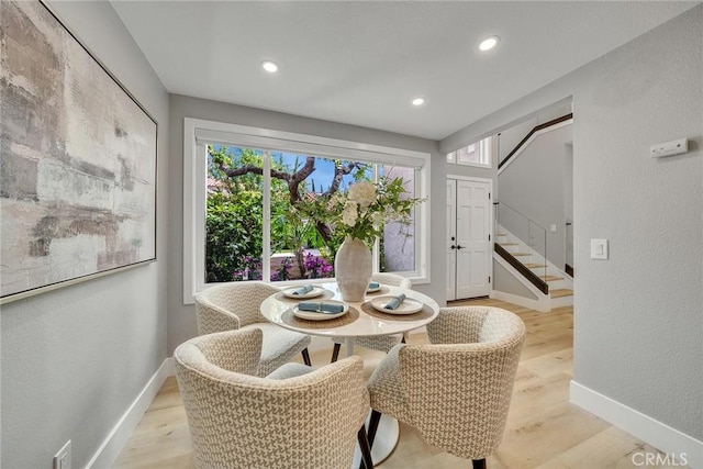 10 Lassen, Irvine, CA 92612 - dining area featuring healthy amount of natural light, stairway, light wood-style floors, baseboards, and recessed lighting