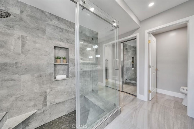 10 Lassen, Irvine, CA 92612 - bathroom featuring toilet, a stall shower, and baseboards