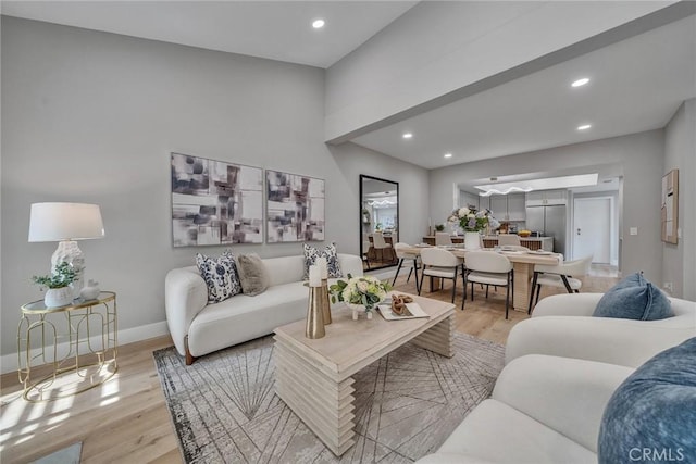 10 Lassen, Irvine, CA 92612 - living area with light wood-type flooring, recessed lighting, and baseboards