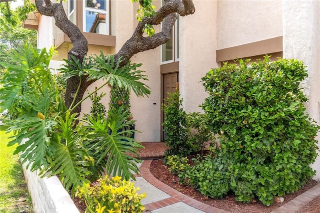10 Lassen, Irvine, CA 92612 - doorway to property featuring stucco siding