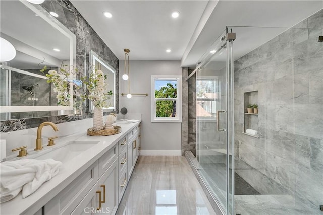 10 Lassen, Irvine, CA 92612 - full bath with double vanity, a marble finish shower, baseboards, and recessed lighting
