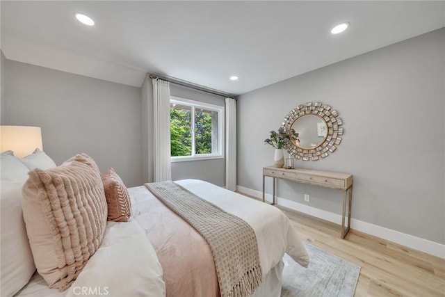 10 Lassen, Irvine, CA 92612 - bedroom with wood finished floors, baseboards, recessed lighting, and vaulted ceiling