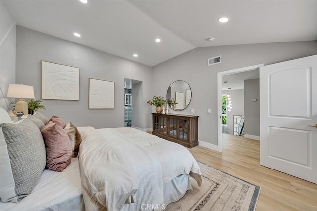 10 Lassen, Irvine, CA 92612 - bedroom with lofted ceiling, light wood finished floors, recessed lighting, and baseboards