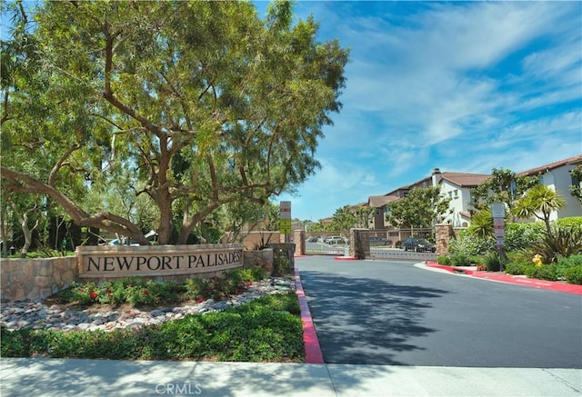 20267 Estuary Ln, Newport Beach, CA 92660 - community / neighborhood sign featuring a gate