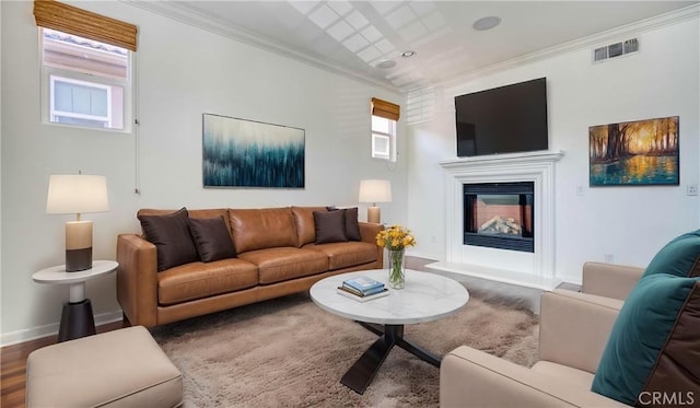 20267 Estuary Ln, Newport Beach, CA 92660 - living room featuring a glass covered fireplace, healthy amount of natural light, crown molding, and baseboards