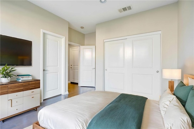 20267 Estuary Ln, Newport Beach, CA 92660 - bedroom featuring dark wood finished floors and a closet