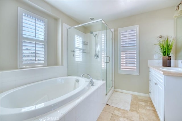20267 Estuary Ln, Newport Beach, CA 92660 - bathroom featuring vanity, a garden tub, a stall shower, and plenty of natural light