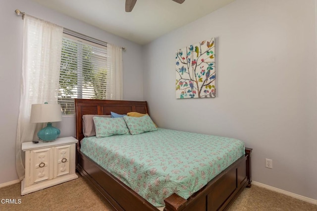 904 Calle Higuera, Camarillo, CA 93010 - bedroom with light colored carpet, baseboards, and a ceiling fan