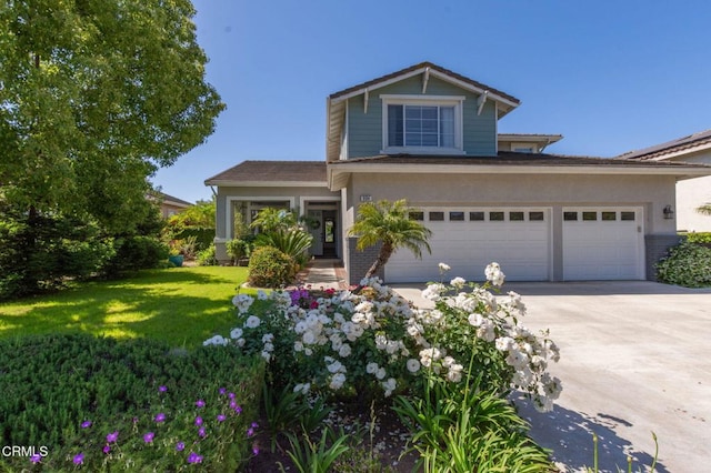 904 Calle Higuera, Camarillo, CA 93010 - view of front of property with concrete driveway, a front yard, an attached garage, and stucco siding