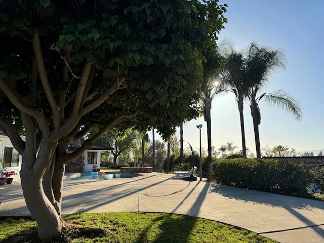 1650 Winterwarm Dr, Fallbrook, CA 92028 - view of property's community featuring a swimming pool and a patio area