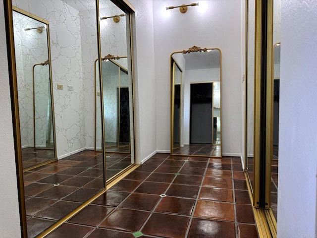 1650 Winterwarm Dr, Fallbrook, CA 92028 - hallway featuring dark tile patterned flooring and baseboards