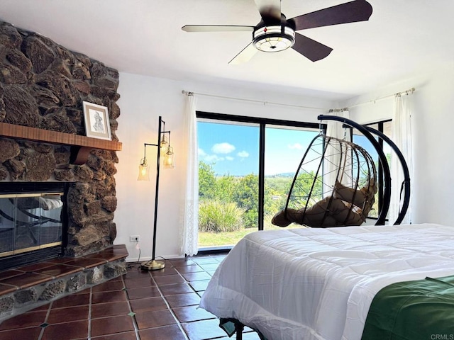 1650 Winterwarm Dr, Fallbrook, CA 92028 - bedroom with access to exterior, tile patterned flooring, ceiling fan, and a fireplace