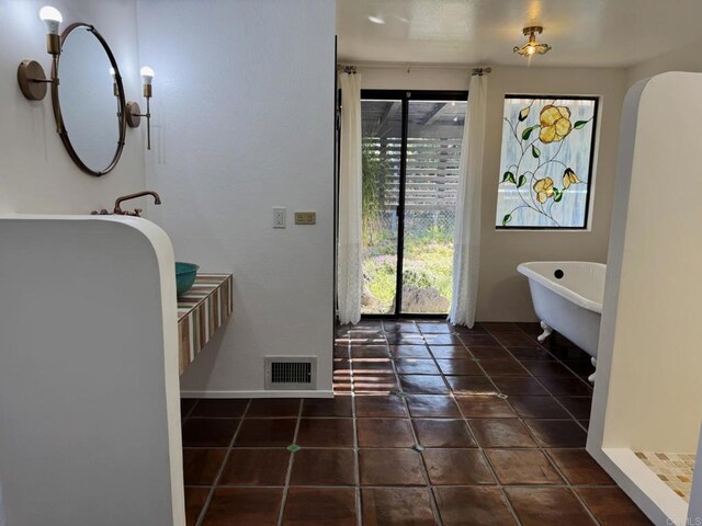 1650 Winterwarm Dr, Fallbrook, CA 92028 - full bath featuring a soaking tub, tile patterned flooring, and baseboards