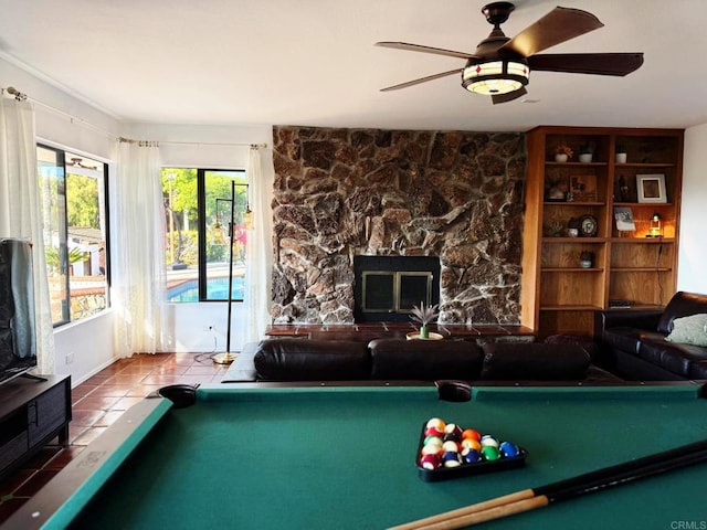 1650 Winterwarm Dr, Fallbrook, CA 92028 - rec room with pool table, a stone fireplace, ceiling fan, and tile patterned floors