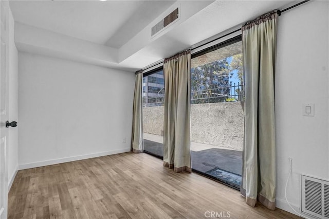 700 W 3rd St Unit A117, Santa Ana, CA 92701 - spare room with wood finished floors and baseboards