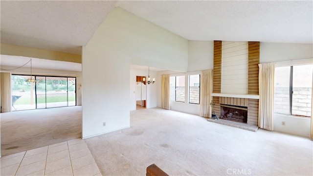 205 Cedar Heights Dr, Thousand Oaks, CA 91360 - unfurnished living room featuring carpet, a chandelier, a fireplace, a textured ceiling, and tile patterned floors