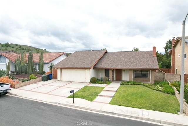205 Cedar Heights Dr, Thousand Oaks, CA 91360 - view of front of house featuring an attached garage and concrete driveway