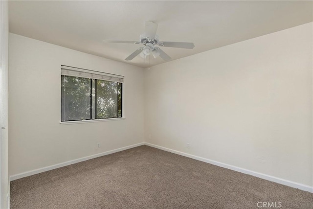 1114 Nord Ave Unit 36, Chico, CA 95926 - spare room featuring carpet floors, baseboards, and ceiling fan
