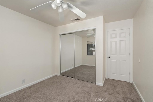 1114 Nord Ave Unit 36, Chico, CA 95926 - unfurnished bedroom with carpet flooring, a closet, baseboards, and a ceiling fan