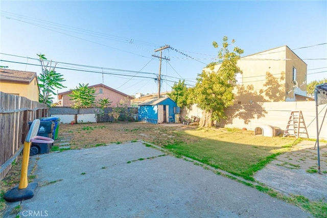151 E 105th St, Los Angeles, CA 90003 - fenced backyard with a patio