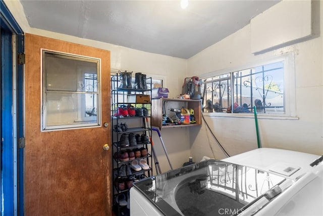 151 E 105th St, Los Angeles, CA 90003 - storage room featuring washing machine and dryer