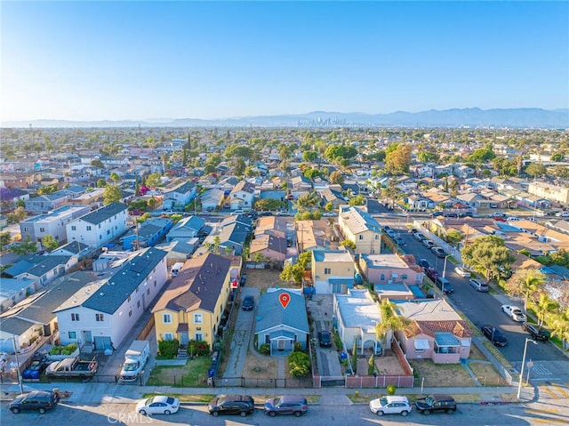 151 E 105th St, Los Angeles, CA 90003 - aerial perspective of suburban area with a mountain backdrop