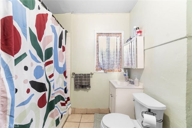 151 E 105th St, Los Angeles, CA 90003 - bathroom featuring toilet, vanity, tile patterned flooring, and curtained shower