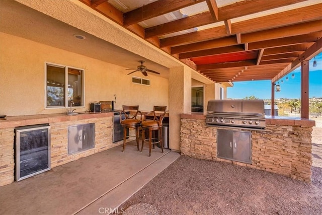 5115 Warren Vista Ave, Yucca Valley, CA 92284 - view of patio featuring wine cooler, a ceiling fan, and a sink