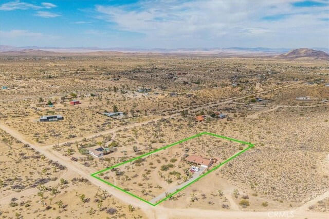 5115 Warren Vista Ave, Yucca Valley, CA 92284 - view of rural area featuring a desert landscape, a mountainous background, and property boundaries highlighted