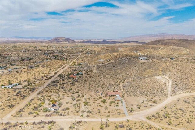 5115 Warren Vista Ave, Yucca Valley, CA 92284 - aerial view of sparsely populated area featuring a desert landscape and mountains