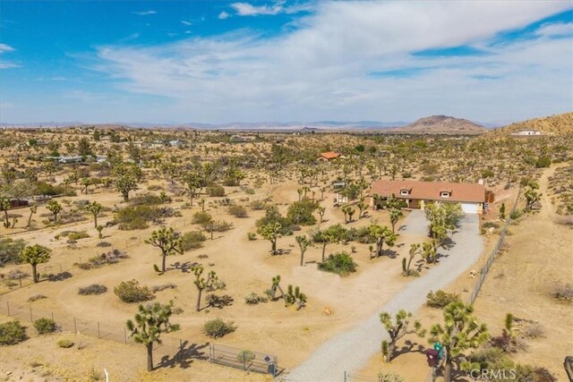 5115 Warren Vista Ave, Yucca Valley, CA 92284 - view of rural area with a desert landscape and a mountain backdrop