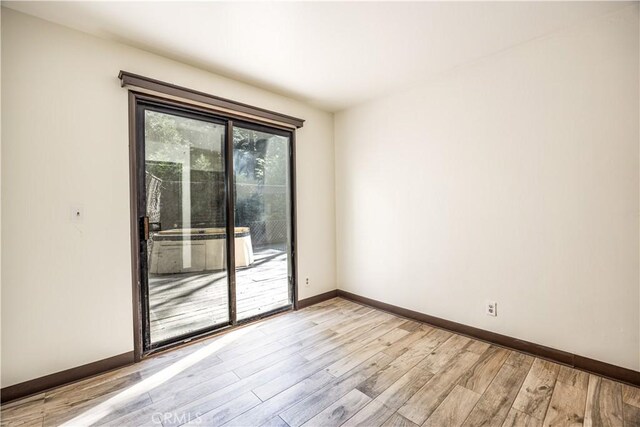 968 Lausanne Dr, Crestline, CA 92325 - spare room with light wood-style floors and baseboards