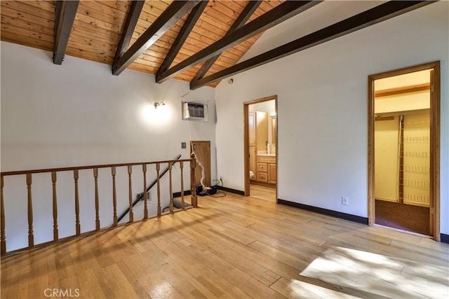 968 Lausanne Dr, Crestline, CA 92325 - spare room featuring wood ceiling, light wood-type flooring, baseboards, and an AC wall unit