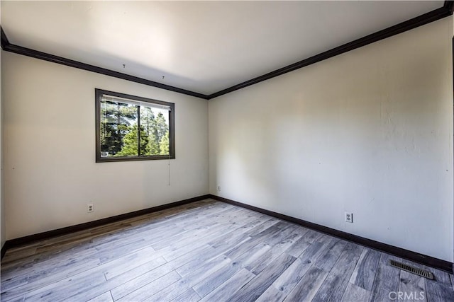 968 Lausanne Dr, Crestline, CA 92325 - spare room with wood finished floors, ornamental molding, and baseboards