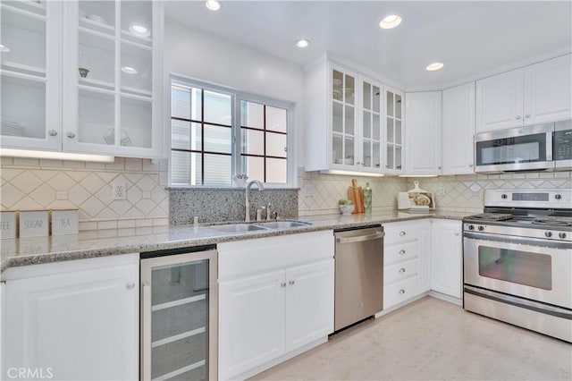 1713 Carlson, Redondo Beach, CA 90278 - kitchen with stainless steel appliances, wine cooler, white cabinetry, and recessed lighting