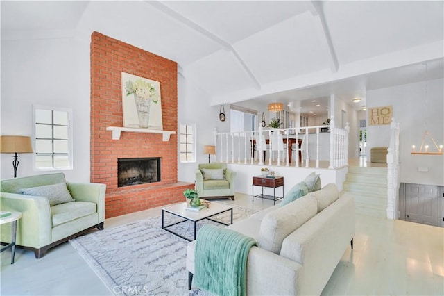 1713 Carlson, Redondo Beach, CA 90278 - living room with plenty of natural light, a brick fireplace, wood finished floors, high vaulted ceiling, and beamed ceiling