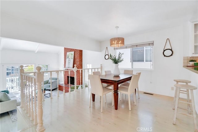 1713 Carlson, Redondo Beach, CA 90278 - dining area with light wood-style flooring and a chandelier