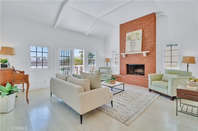 1713 Carlson, Redondo Beach, CA 90278 - living area with healthy amount of natural light, wood finished floors, a brick fireplace, high vaulted ceiling, and beam ceiling